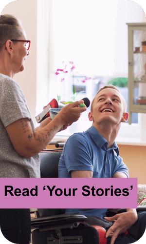 A young man in a wheelchair chatting to his mum